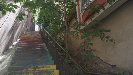 colorful stairs in an urban alleyway