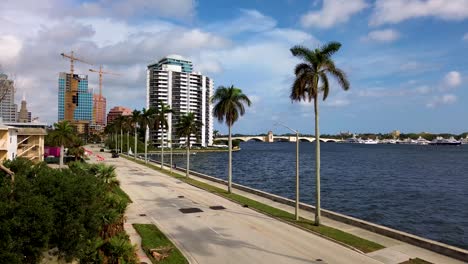 A-fly-over-of-Flagler-Drive-in-West-Palm-Beach,-Florida