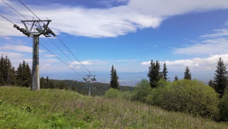shot next to lift towers in the mountain