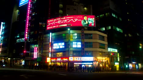 night lapse with japanese neons at south shinjuku wide shot zoom out