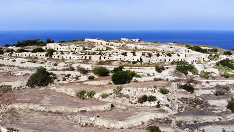 wonderful aerial drone video from malta, mellieha, selmun area, flying over the historical fort campbel with the land and sea in the view