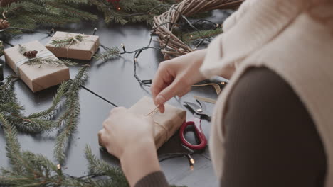 tying twine on christmas present