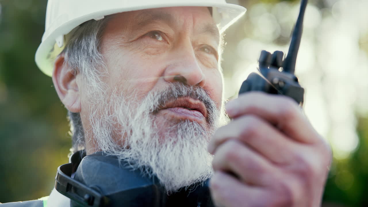 Construction worker with walkie talkie