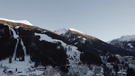 Panoramic-Drone-View-of-Austrian-Mountain-Hotel-in-Snowy-Landscape-in-Salzburg-Austria