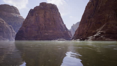 mysterious rock formations reflecting in the calm waters of a remote canyon