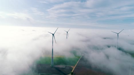 Wind-turbines-above-the-clouds-aerial