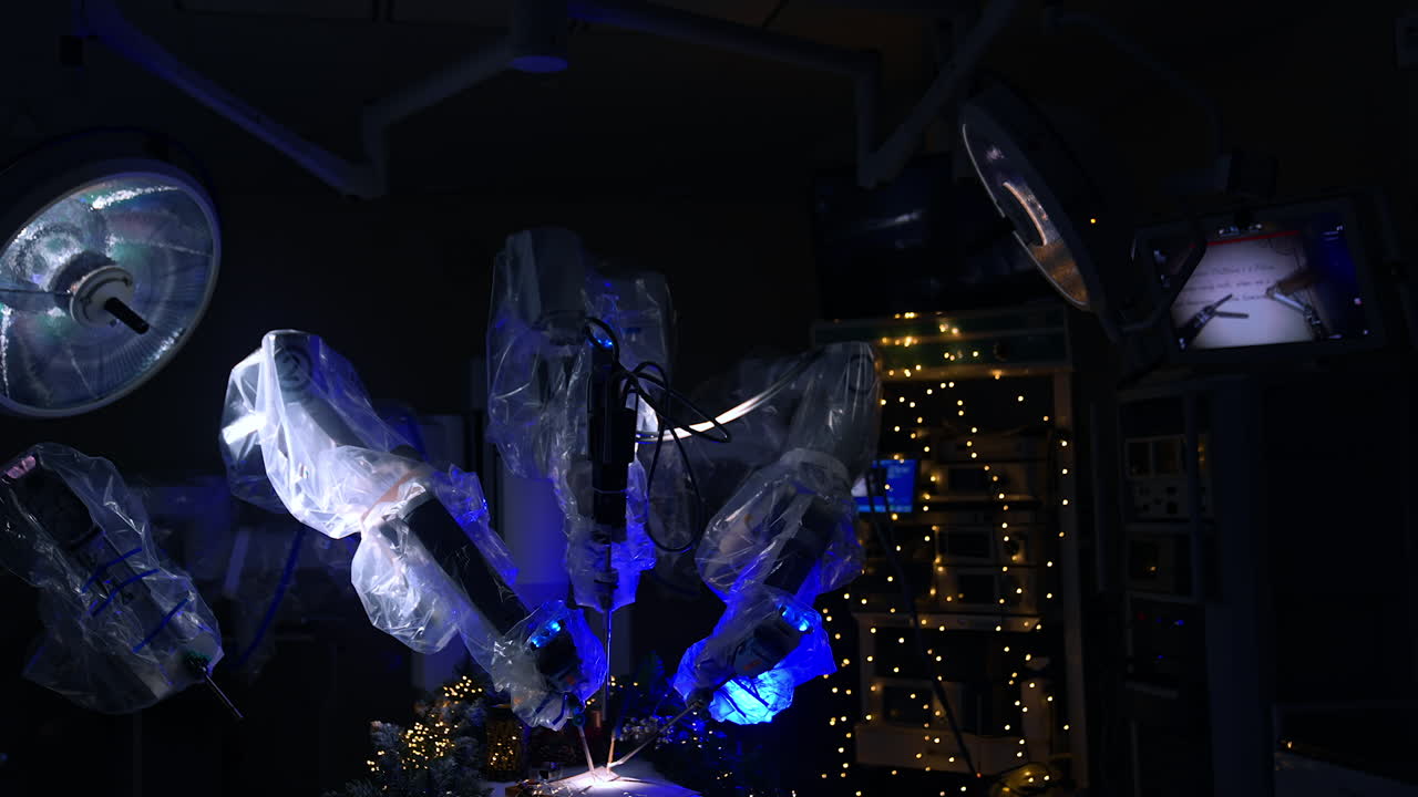 New technological equipment in modern surgical room with switched off lights. High-precise robotic arms write with a writing pen.