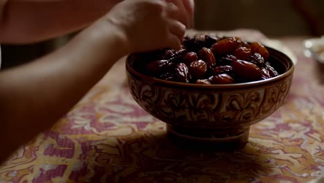 dates on a table and a moonlit window