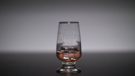 drink on the rocks slow motion light effect