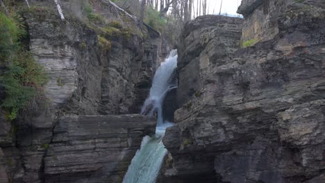 st mary falls in glacier national park, tilt down