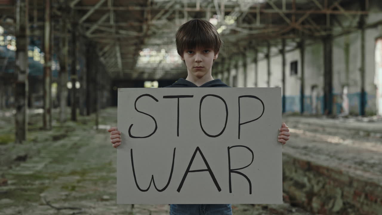 Child Protesting War in an Abandoned Factory