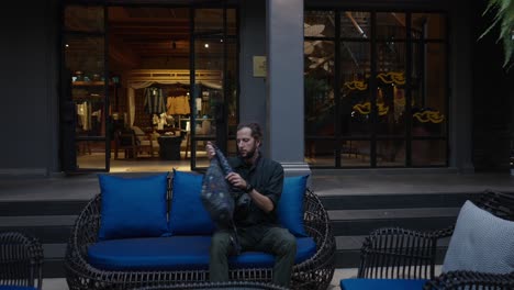 man arriving and relaxing at a tropical hotel resort