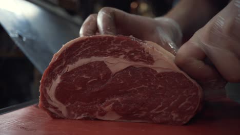 chef preparing a rib eye steak