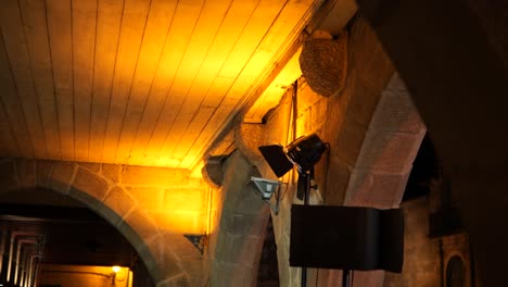 illuminated dome and ceiling of historic roman-style building in guimarães