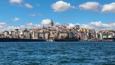 epic panoramic view of waterfront istanbul city over bosporus strait, real time shot