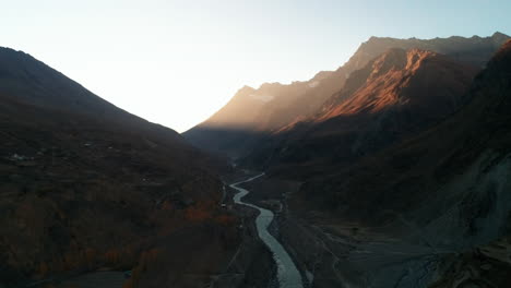 stunning and magical autumn morning sunrise over high altitude mountains