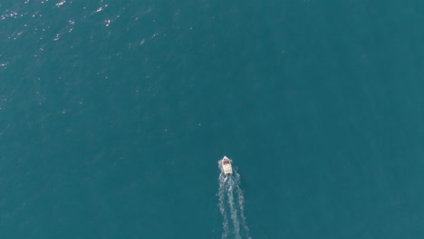 top view of boat sailing to an island in lefkada