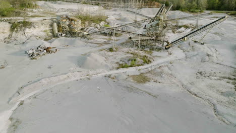 Pile-Of-Sand-Under-Conveyor-Belts-In-Hickory-Creek-Mine-In-Arkansas,-USA