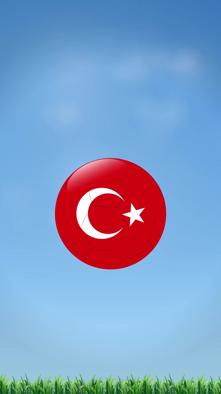 Mavi gökyüzü ve yeşil çim arka planına karşı dikey olarak zıplayan kırmızı bir futbol topu