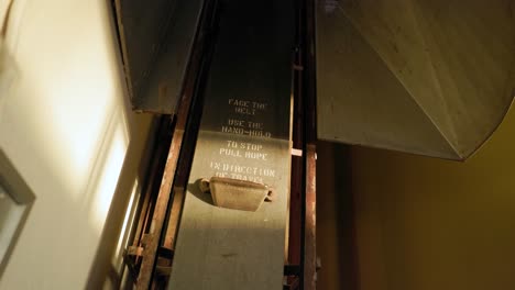 old antique elevator inside an abandoned grain silo, no people establishing shot