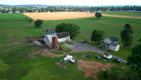 Aerial-drone-video-of-farmland-agriculture-during-sunset