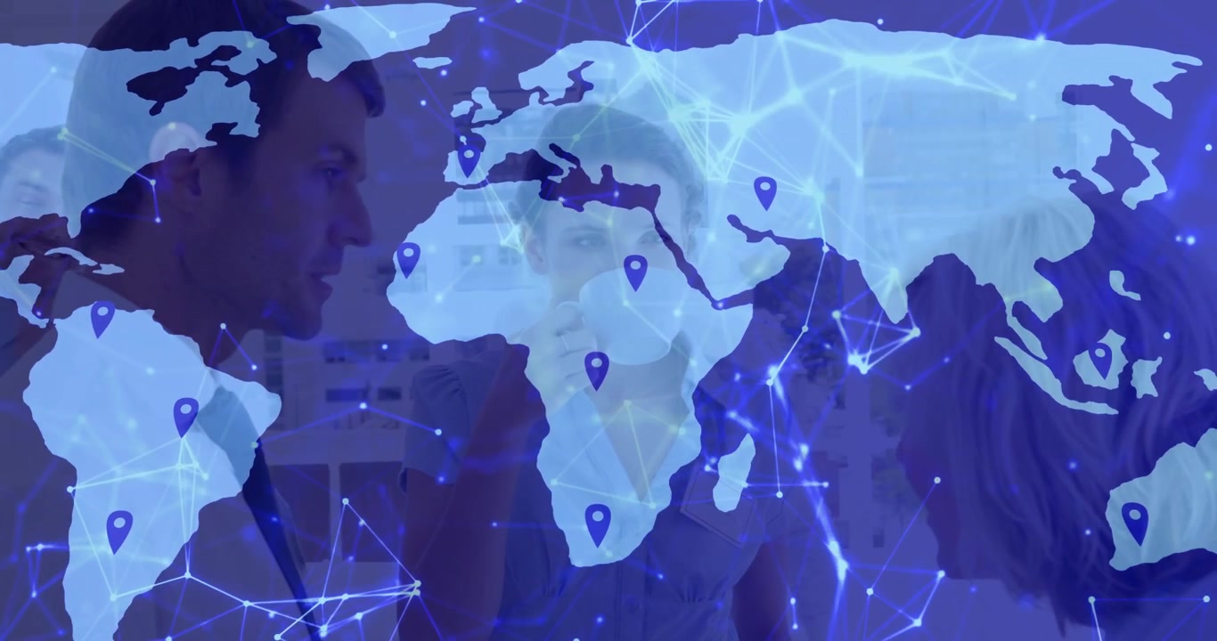 Business team discussing over mugs, overlaying map fading into network visualizing global reach