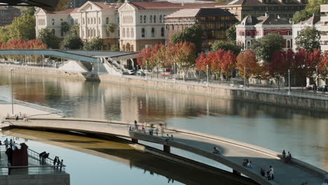 autumnal european cityscape by the river