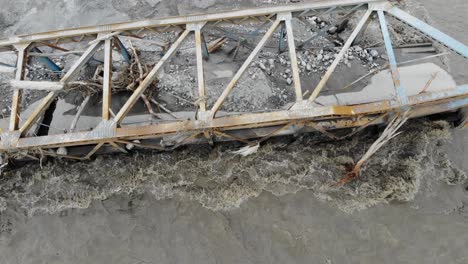 a vital bridge linking two villages in nepal was washed away by powerful floods driven by extreme weather and global warming. the loss has isolated communities and exposed climate vulnerability