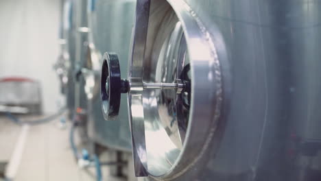 industrial brewery tank with valves