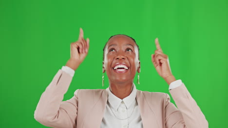 Happy,-black-woman-and-pointing-up-on-green