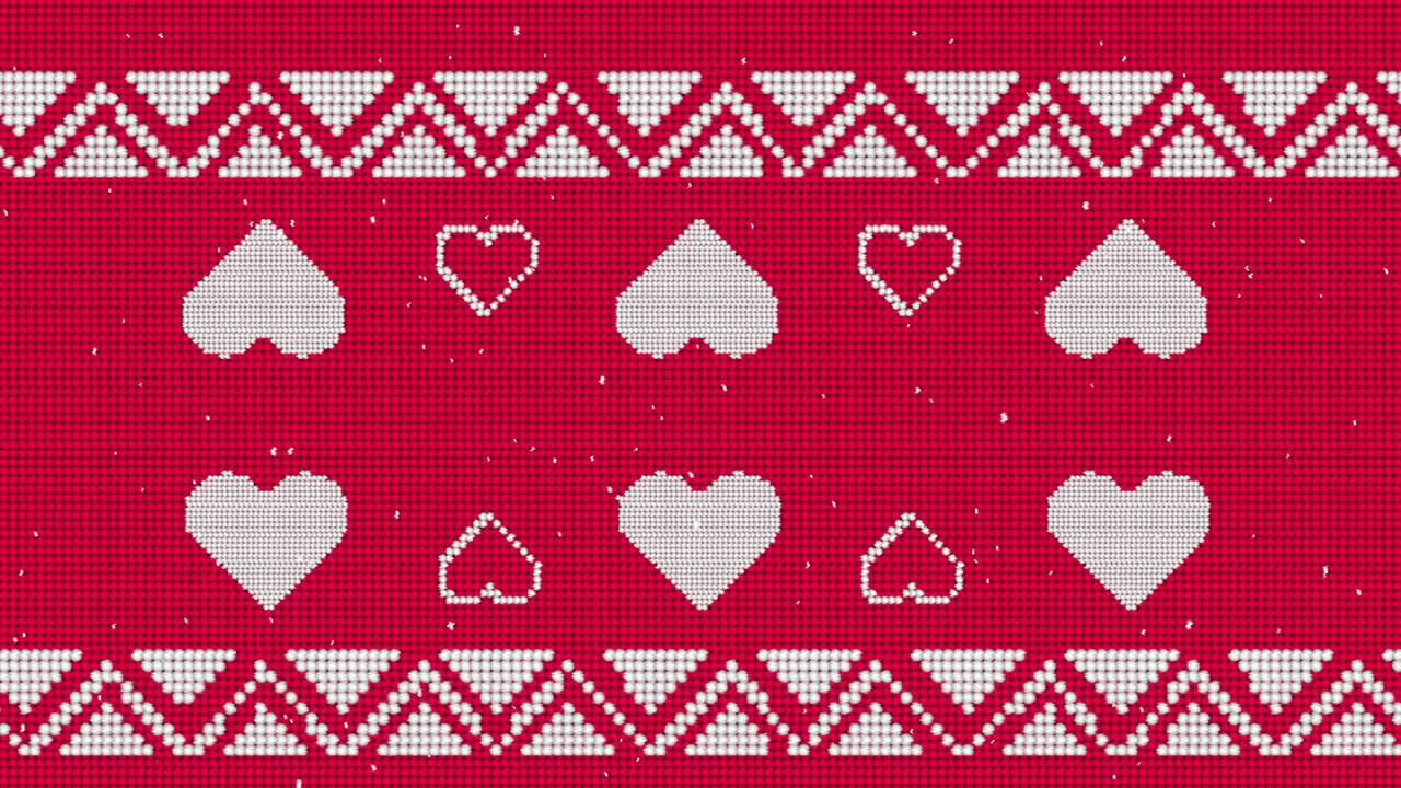 patrón tradicional de navidad con múltiples corazones contra un fondo rojo