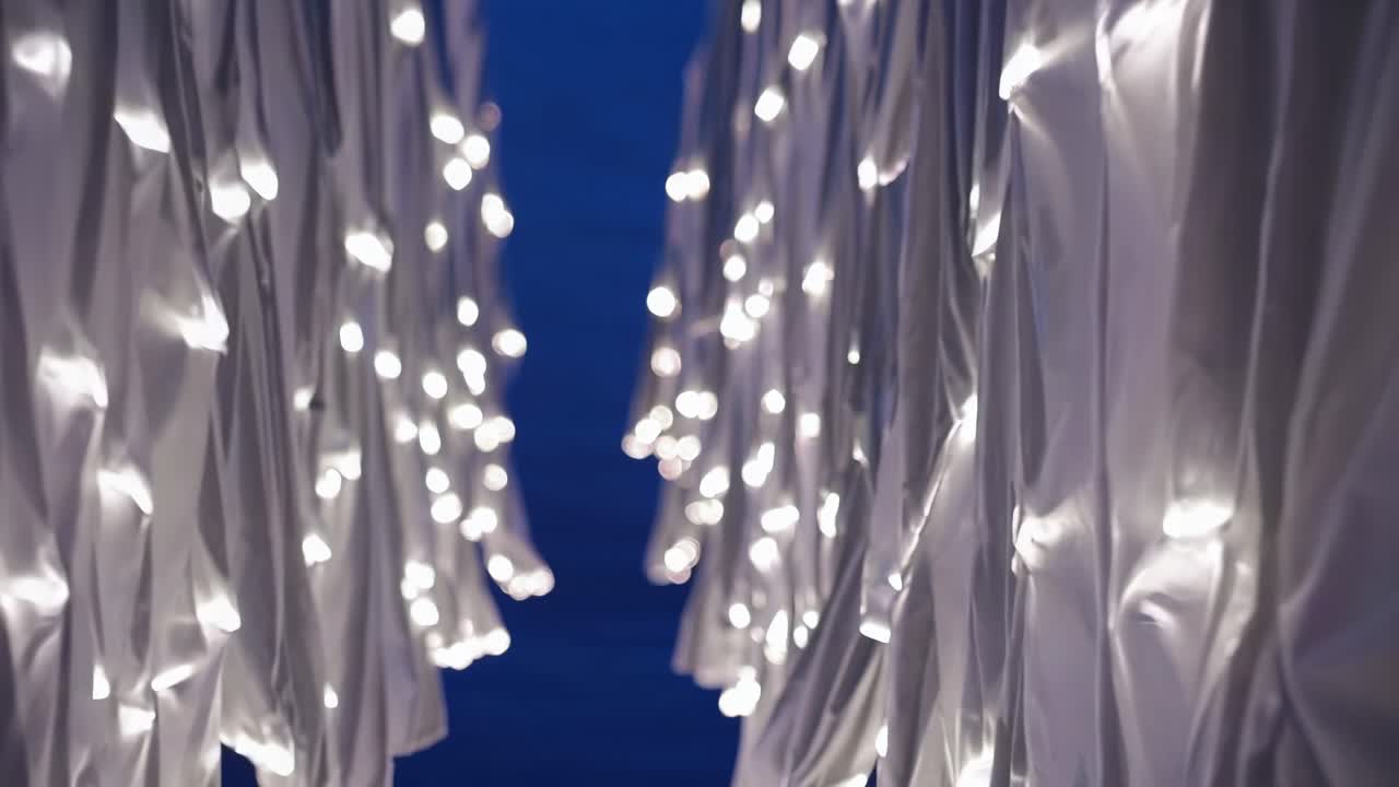 Abstract lights and white fabric backdrop