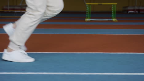 senior woman running indoors