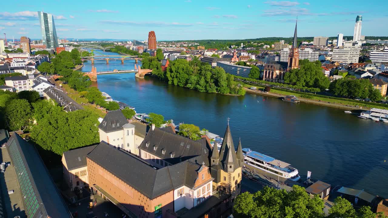 4K Drone Video of the Historic Churches and Buildings on the Main River in Downtown Frankfurt, Germany