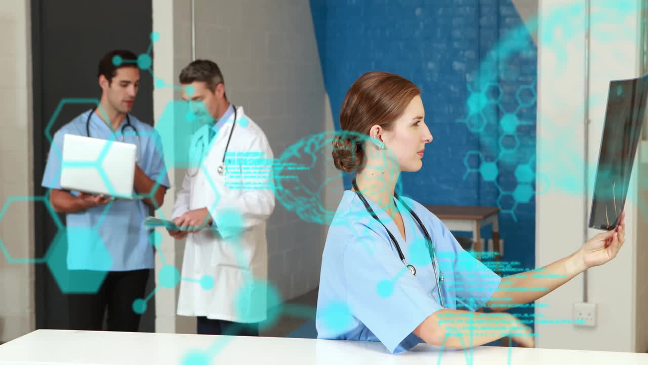 Animation of data processing over caucasian doctors talking and checking xray
