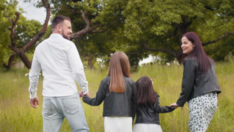 family enjoying a walk in the park