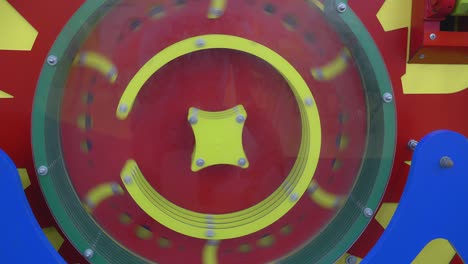 a spinning wheel. a multicolored disk in motion.