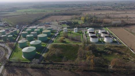 aerial view of steel round oil storage tanks, storage and handling services for petroleum products