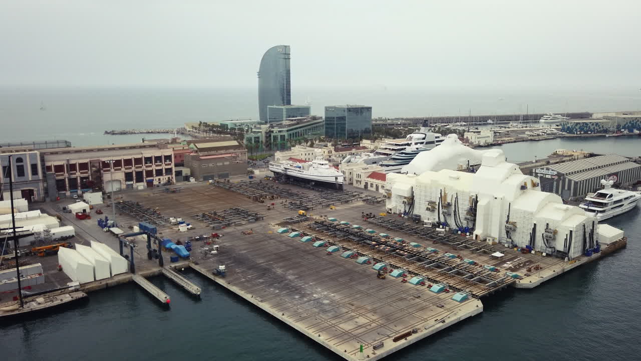 Aerial drone view of the Port Vell in Barcelona, Spain
