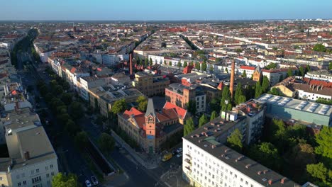 berlin's urban landscape, capturing a mix of residential and commercial buildings, streets, and green spaces. best aerial view flight speed ramp hyper motion time lapse