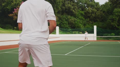 tennis players playing a point