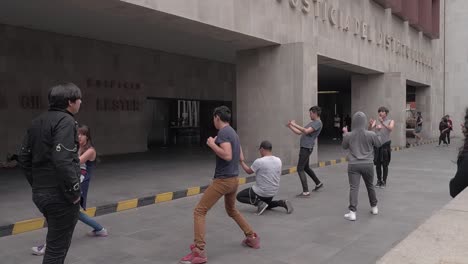 young urban dancers practicing tik-tok choreography in street. slow motion