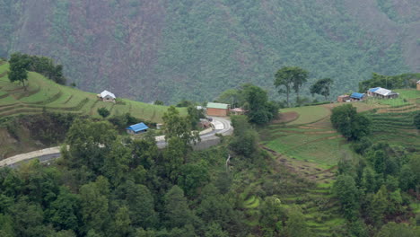 A-panning-view-of-the-green-terraced-hillsides-of-the-Himalayan-Foothills-in-Nepal