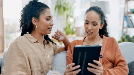 tablet, lesbian couple and talking on home sofa to