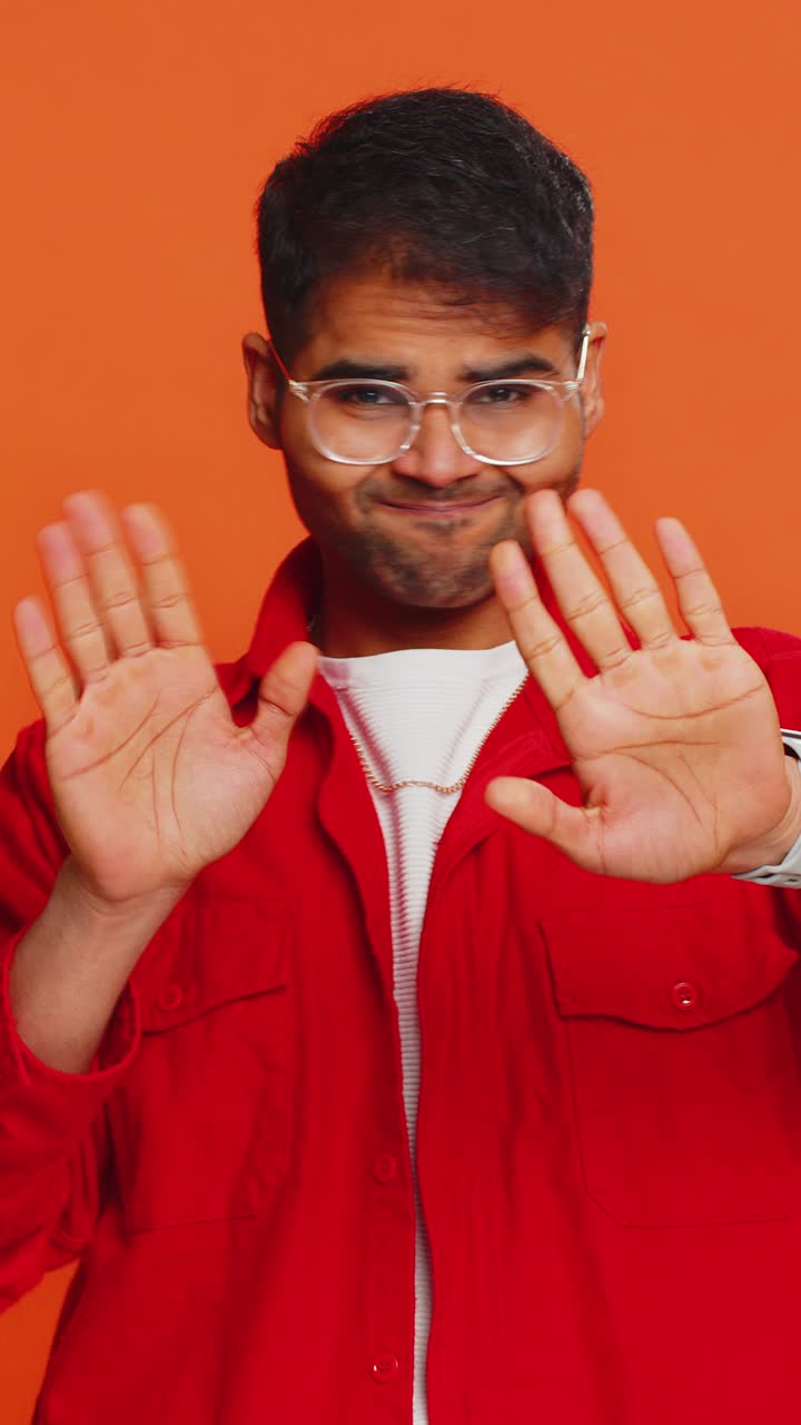 Afraid shocked indian man closing eyes confused shy scared reject to watch phobia shame stress