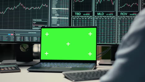 portfolio manager analyzes market trends on isolated screen laptop