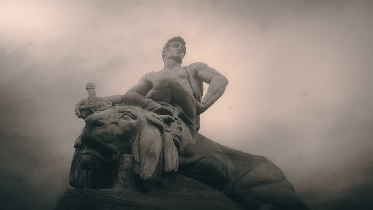 Epic, ancient stone statue on cloudy day and windy weather.