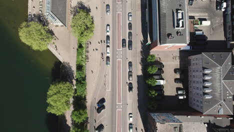 Capture-the-bustling-streets-of-central-Copenhagen-from-a-bird's-eye-perspective,-revealing-the-vibrant-pulse-of-the-city's-urban-life