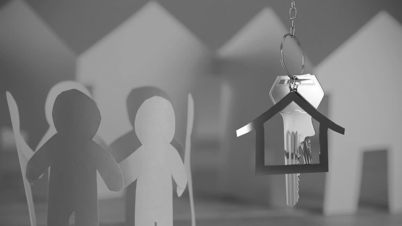 주택 키와 키 이 사람 위에 매달려 있고 주택이 배경에서 잘라져 있습니다.