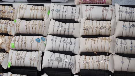 variety of evil eye bracelets on display